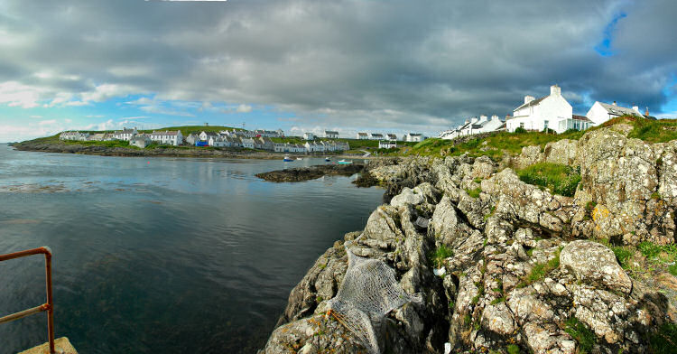 Picture of a panoramic view over a small coastal village around a small bay