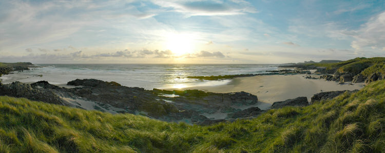 Picture of a sandy bay in the late evening light