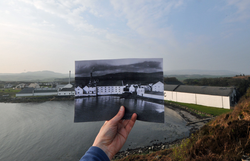 Composite picture of two pictures, old and new, showing Laphroaig distillery from the hill to the south east